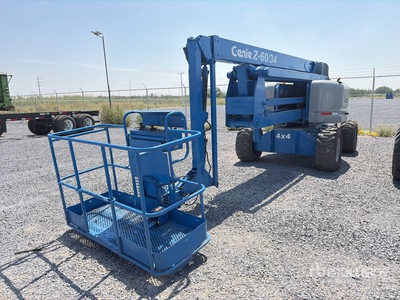 1999 Genie Z60/34 RT 4WD Gasoline Elevador Articulado / Articulating Boom Lift