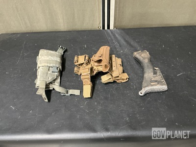 (16) Buttstocks, (9) Pistol Holster Carriers & Assorted Items