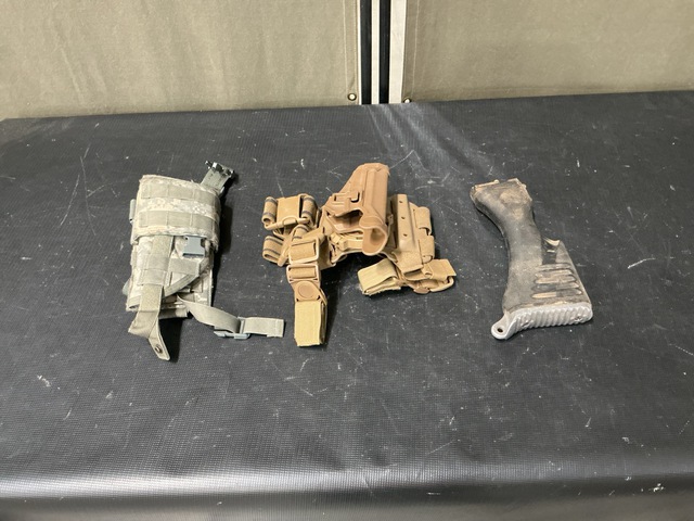 (16) Buttstocks, (9) Pistol Holster Carriers & Assorted Items