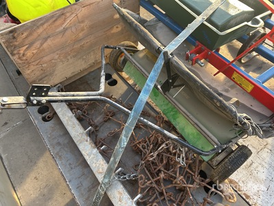 Tow behind sweeper