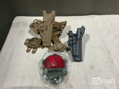 (2) Mechanical Pullers, (22) Individual Holsters & Assorted Items