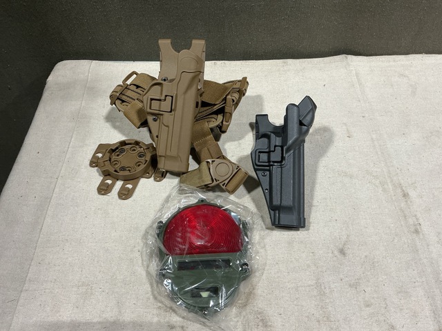 (2) Mechanical Pullers, (22) Individual Holsters & Assorted Items (2) Mechanical Pullers, (22) Individual Holsters & Assorted Items