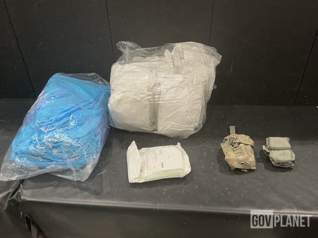 (1) Case of Boot Covers, (1) Case of Drapes & (87) Individual First Aid Kits