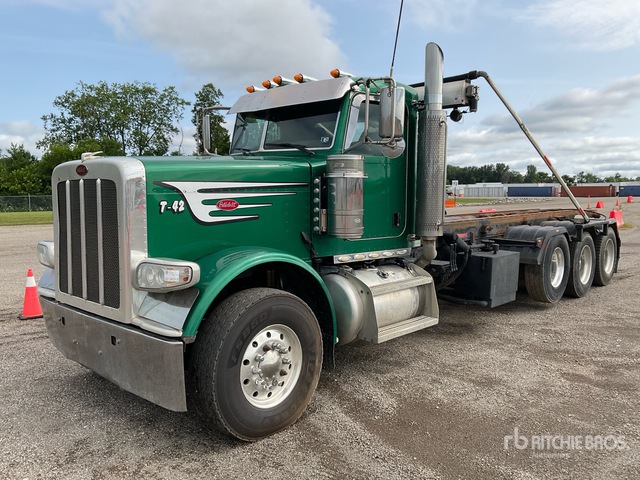 2016 Peterbilt 389 8x4 Roll-Off Truck (Glider Kit)