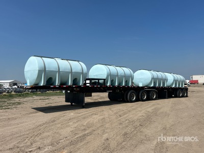 2014 Doepker 32 ft Tri/A Super B-Train Lead مقطورة مسطحة