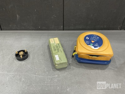 (1) Defibrillator, (6) Wet Globe Kits & Assorted Items