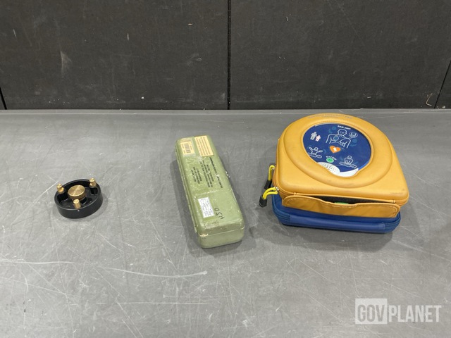 (1) Defibrillator, (6) Wet Globe Kits & Assorted Items