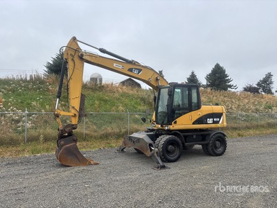 2007 Cat M313D Pelles sur Pneus