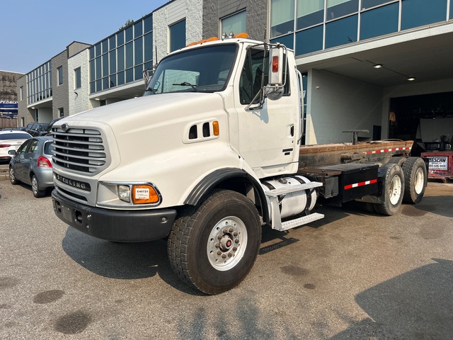 2006 Sterling L8500 6x4 Roll-Off Truck