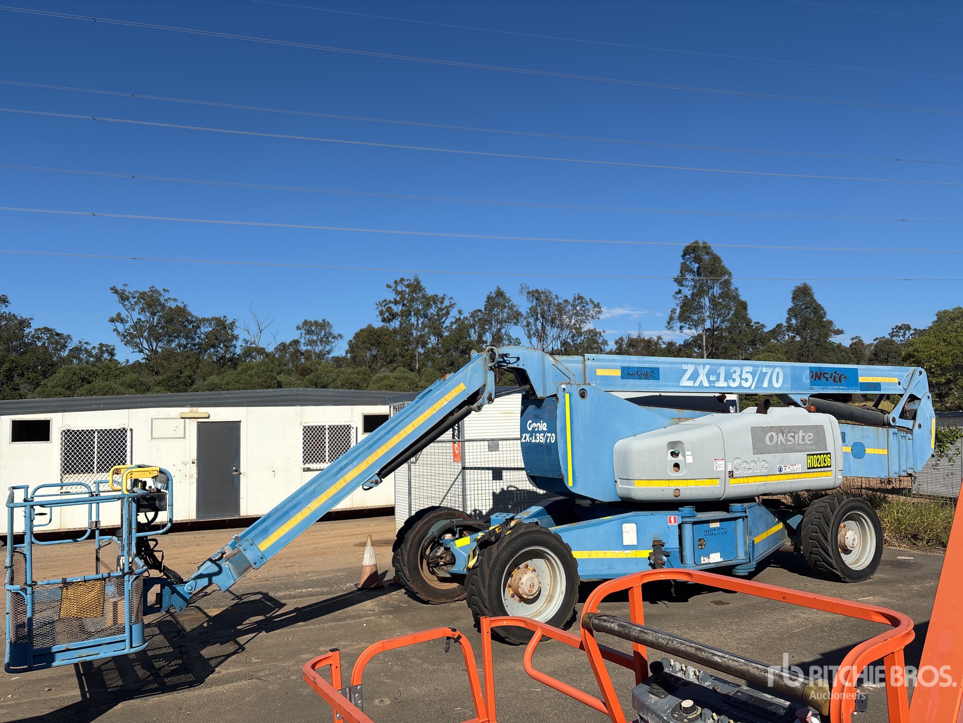 2014 Genie ZX135/70 4WD Diesel Articulating Boom Lift in Forest