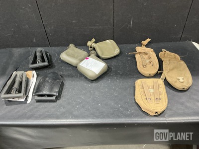 (33) Entrenching Tools, (57) Canteens, (97) Tool Carriers & Assorted Items