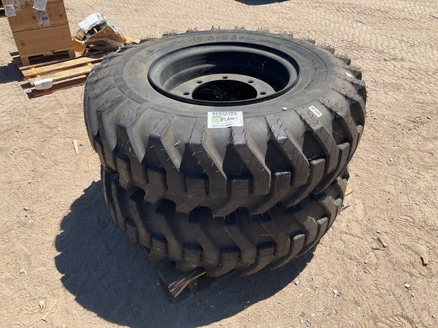 (2) S.T.A. 17.5-25 Tires w/Wheels
