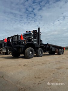 2007 Kenworth C500 8x4 Twin-Steer شاحنة مسطحة