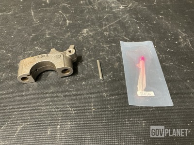 (1) Headless Pin, (2) Camshaft Caps, (1) Transformer & Assorted Items