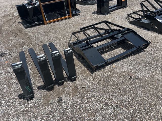 Quantity of (2) 48 in Skid Steer Forks (Unused)