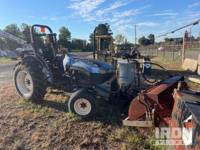 1999 New Holland TN55 Tractor escoba