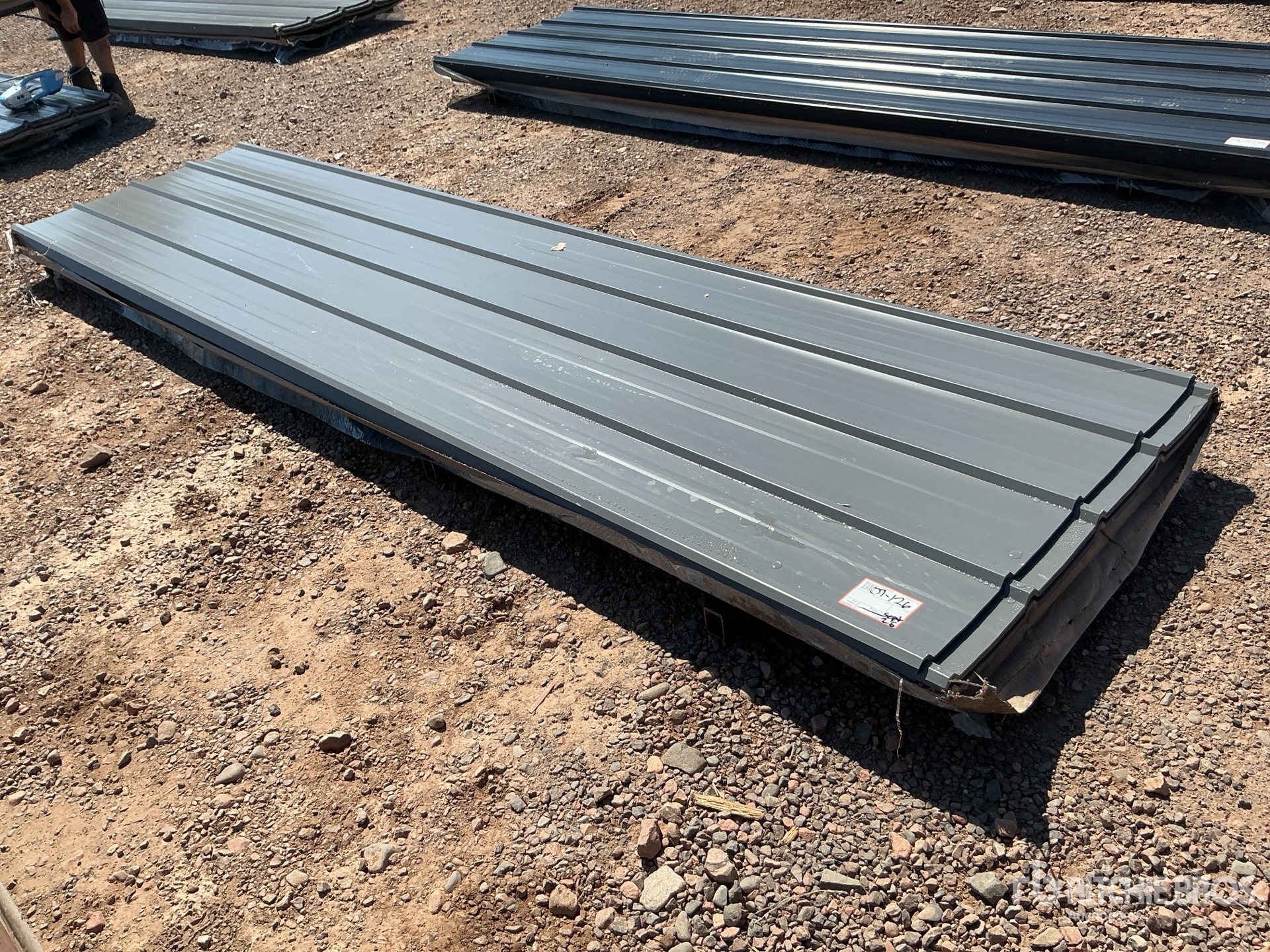 Quantity of (100) 12 ft x 3 ft Grey Metal Roof Panels (Unused)