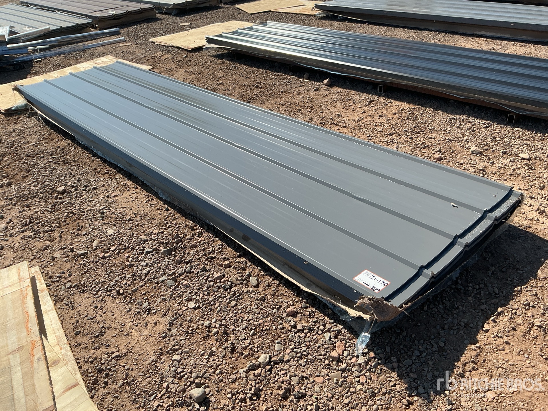 Quantity of (100) 12 ft x 3 ft Grey Metal Roof Panels (Unused)