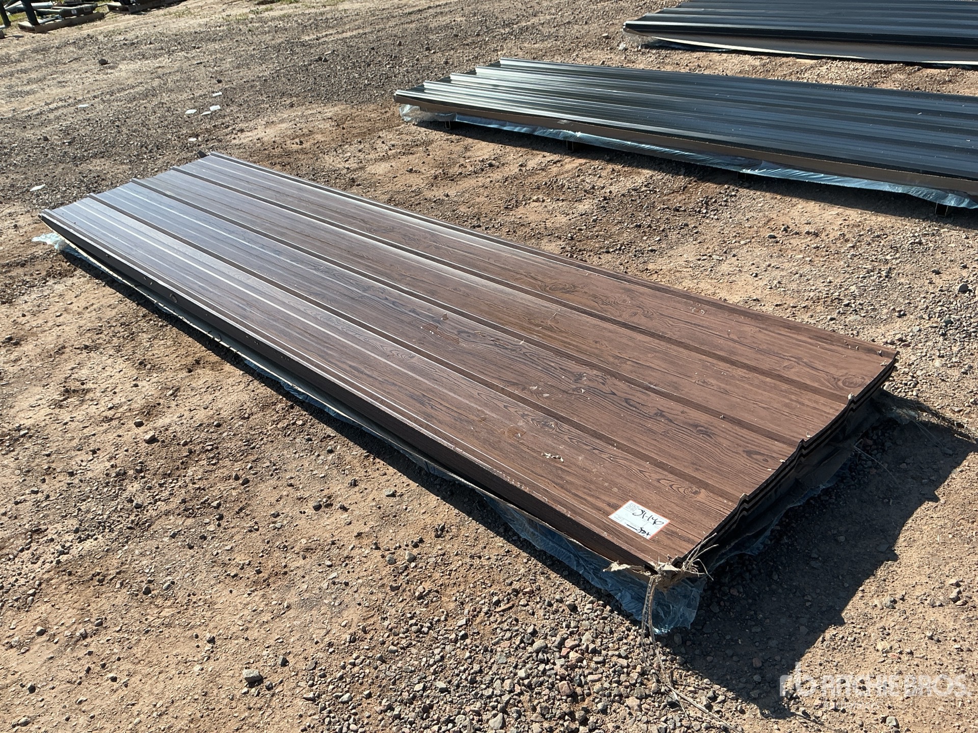Quantity of (100) 12 ft x 3 ft Brown Metal Roof Panels (Unused)