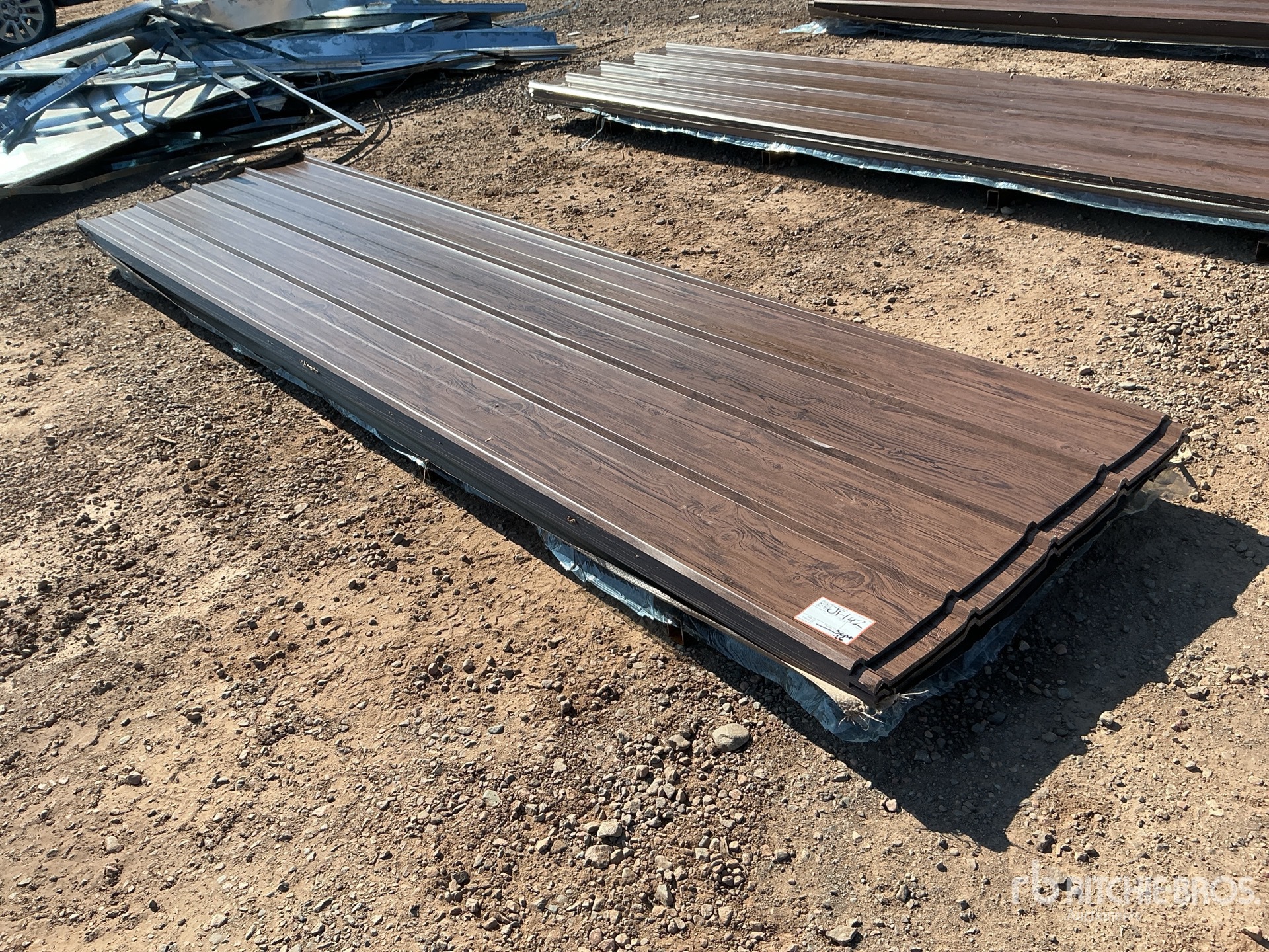 Quantity of (100) 12 ft x 3 ft Brown Metal Roof Panels (Unused)