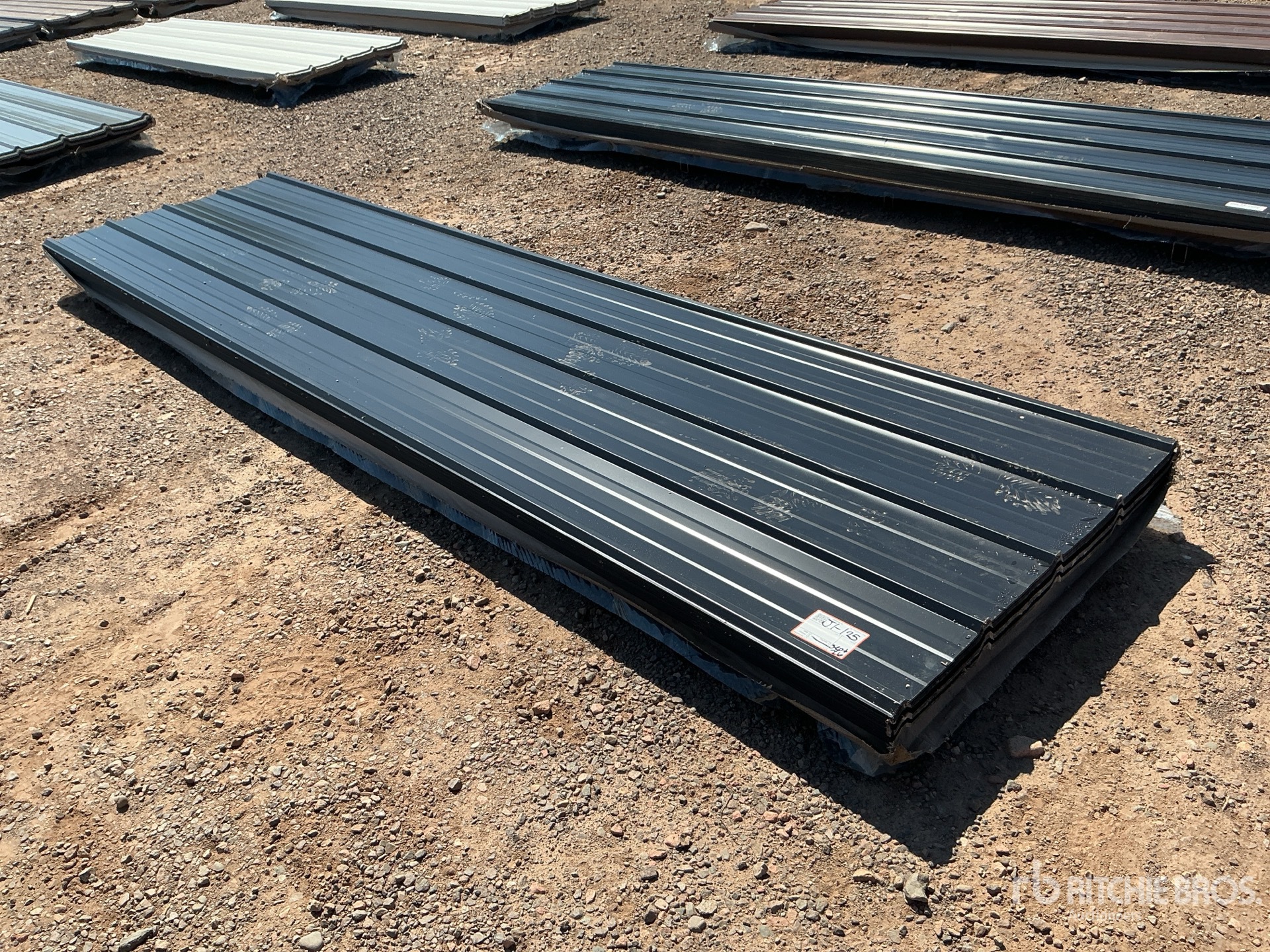 Quantity of (100) 12 ft x 3 ft Black Metal Roof Panels (Unused)