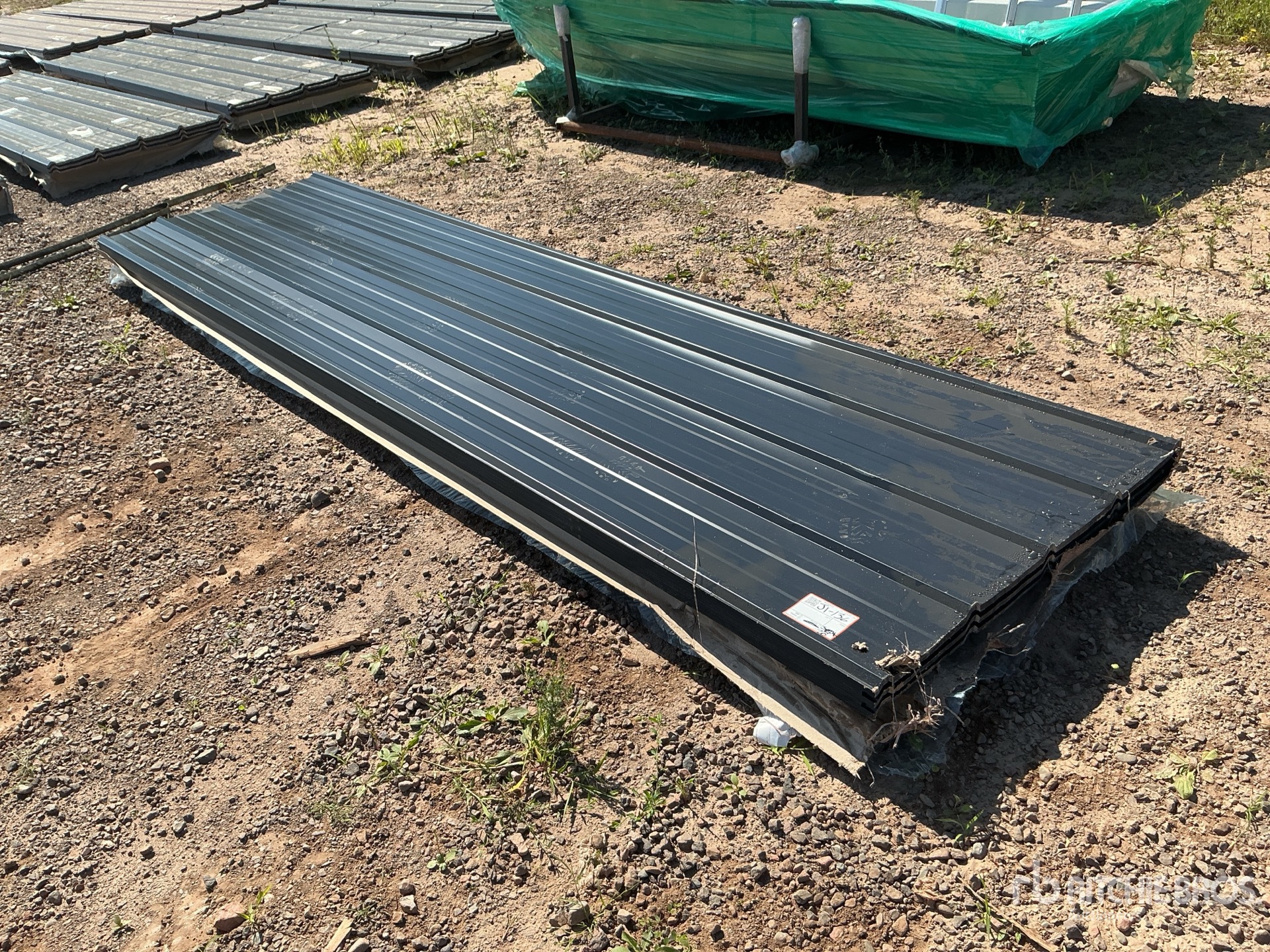 Quantity of (100) 12 ft x 3 ft Black Metal Roof Panels (Unused)