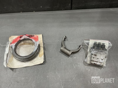 (1) Valve Declutch Fork, (2) Wearing Rings, (1) Pump Housing & Assorted Items