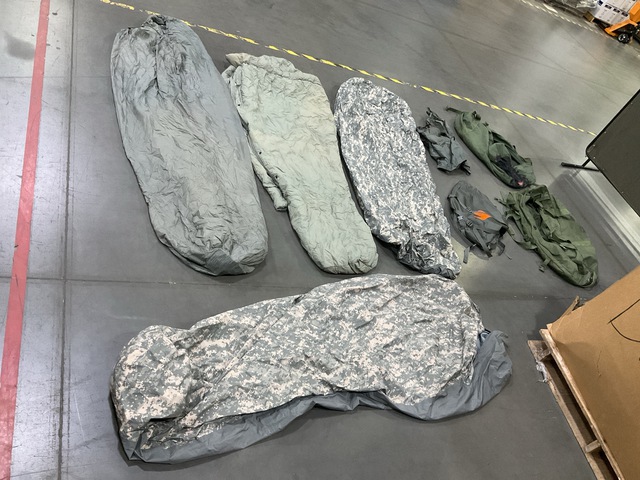 (14) Modular Sleeping Bag Systems, (42) Duffle Bags & Assorted Items