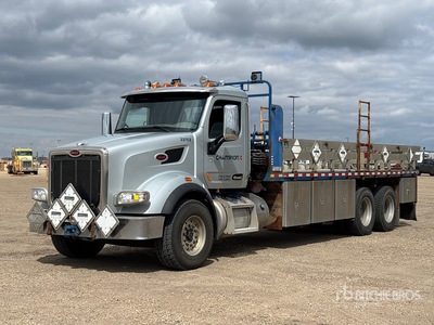 2016 Peterbilt 567 6x4 平台トラック