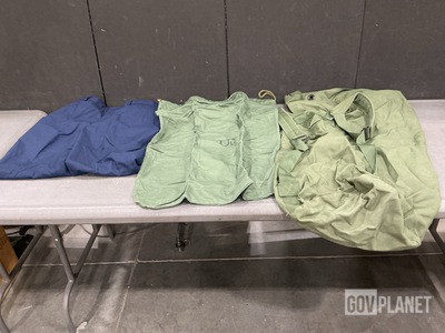 (34) Duffel Bags, (124) Pairs of Men's Trousers & Assorted Items