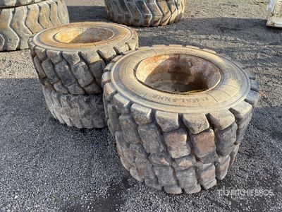 Quantity of (4) 12-16.5L-5 NHS Tires