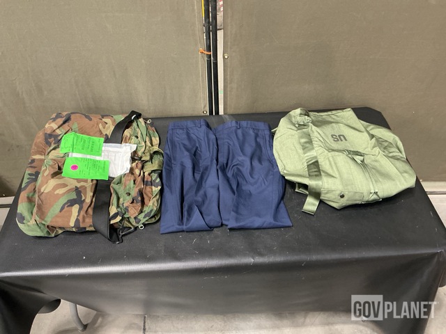 (70) Duffel Bags, (43) Pairs of Men's Trousers & Assorted Items