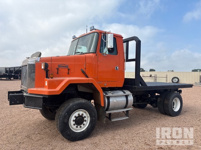 2000 Volvo ACL 4x4 Flatbed Truck