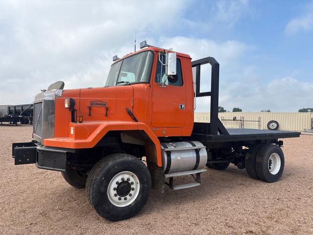 2000 Volvo ACL 4x4 Flatbed Truck