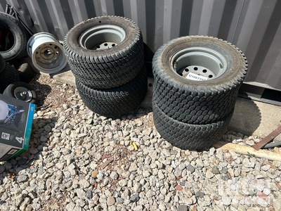 Quantity of (4) Kenda and Carlstar Super Turf 24x12-12.00 إطارات المعدات