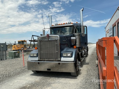 2012 Kenworth W900 تراكتور شاحنة (ثلاثي المحور)