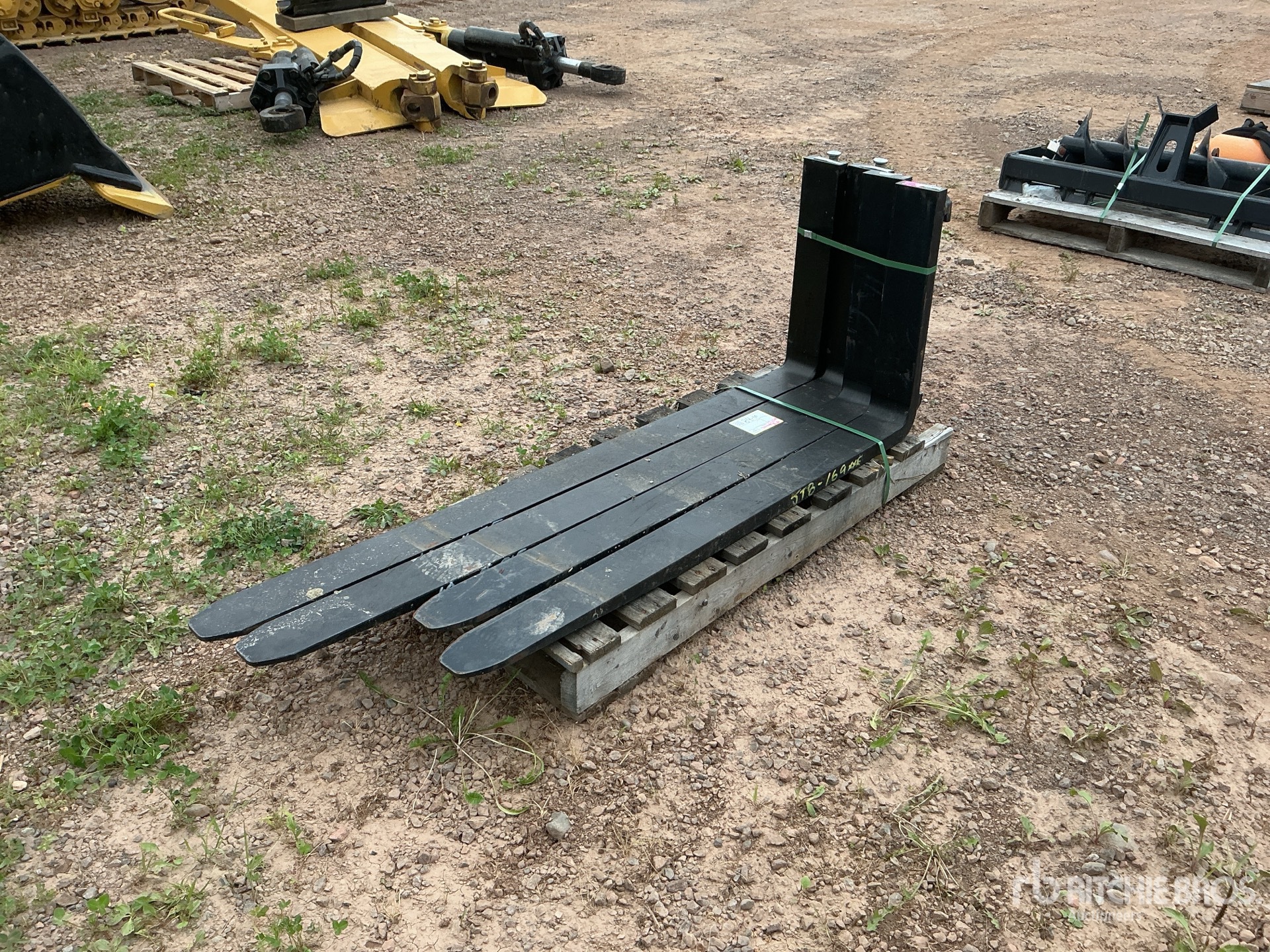 Quantity of (2) AGT SAII100 60 in and 48 in Skid Steer Forks (Unused)