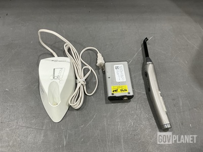 (1) Dental Curing Unit Base, (1) Light Source & Assorted Items