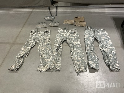 (11) Pairs of Wet Weather Trousers, (45) M4 Three Mag Pouches & Assorted Items