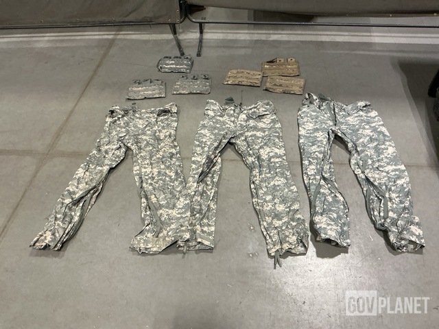 (11) Pairs of Wet Weather Trousers, (45) M4 Three Mag Pouches & Assorted Items