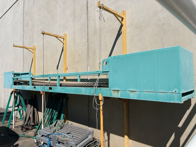 Quantity of (2) 67 mm Wire Sling & Rack