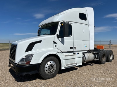 2012 Volvo 670 6x4 T/A Sleeper Truck Tractor