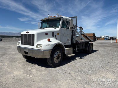 1997 Peterbilt 330 4x2 Flat bed single axle truck with reel holders and take off job box Flatbed Truck