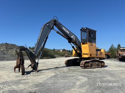 2000 John Deere 370 محمل الجذوع