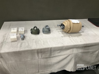 (8) Fluid Filter Elements, (2) Masks, (1) Air Brake Chamber & Assorted Items