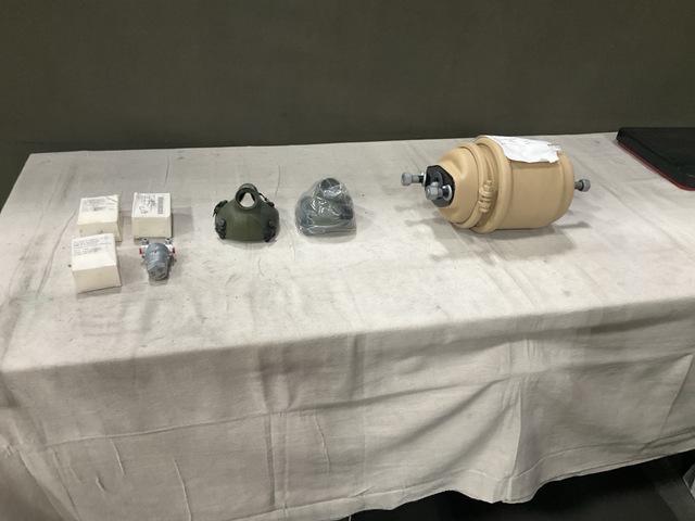 (8) Fluid Filter Elements, (2) Masks, (1) Air Brake Chamber & Assorted Items (8) Fluid Filter Elements, (2) Masks, (1) Air Brake Chamber & Assorted Items