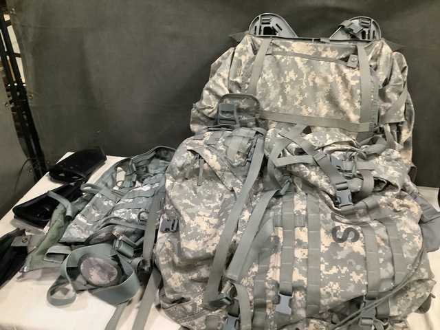 (13) Entrenching Tools, (1) Vest, (2) Large Field Pack Sets & Assorted Items