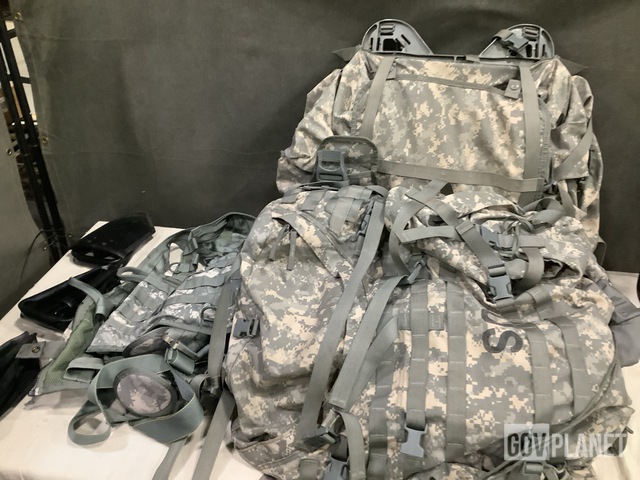 (13) Entrenching Tools, (1) Vest, (2) Large Field Pack Sets & Assorted Items