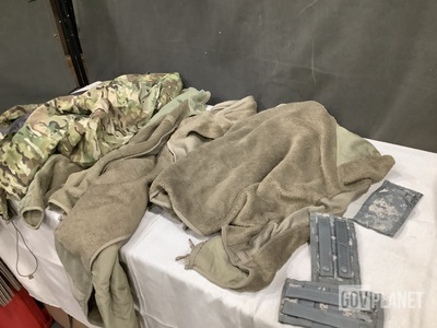 (7) Wet Weather Jackets, (122) M4 Two Mag Pouches & Assorted Items