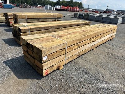 Quantity of (12) 6 in x 12 in x 16 ft Surplus Pressure Treated Tablas de madera